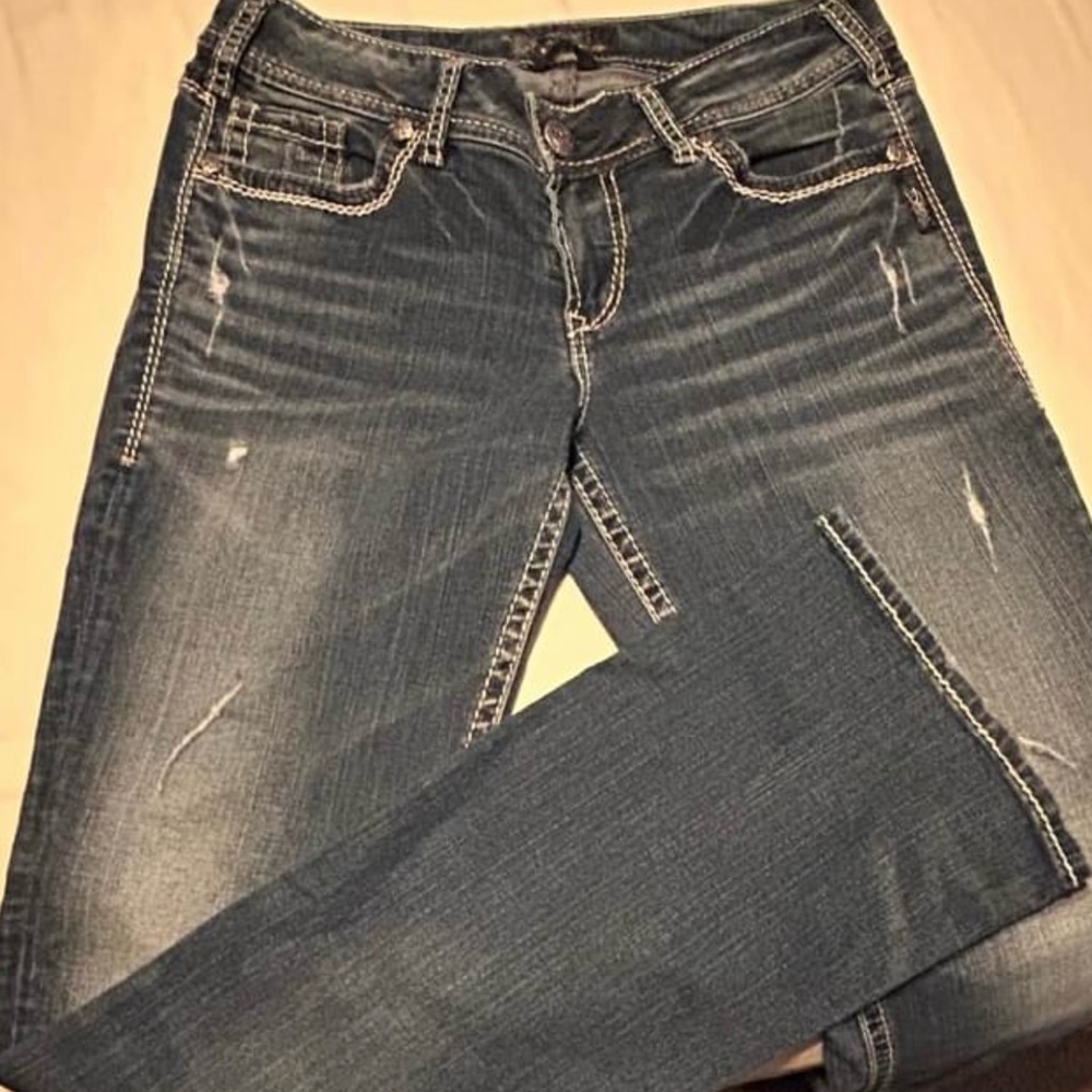 Silver Suki bootcut jeans. Blue denim distressed. Size 29W/33L